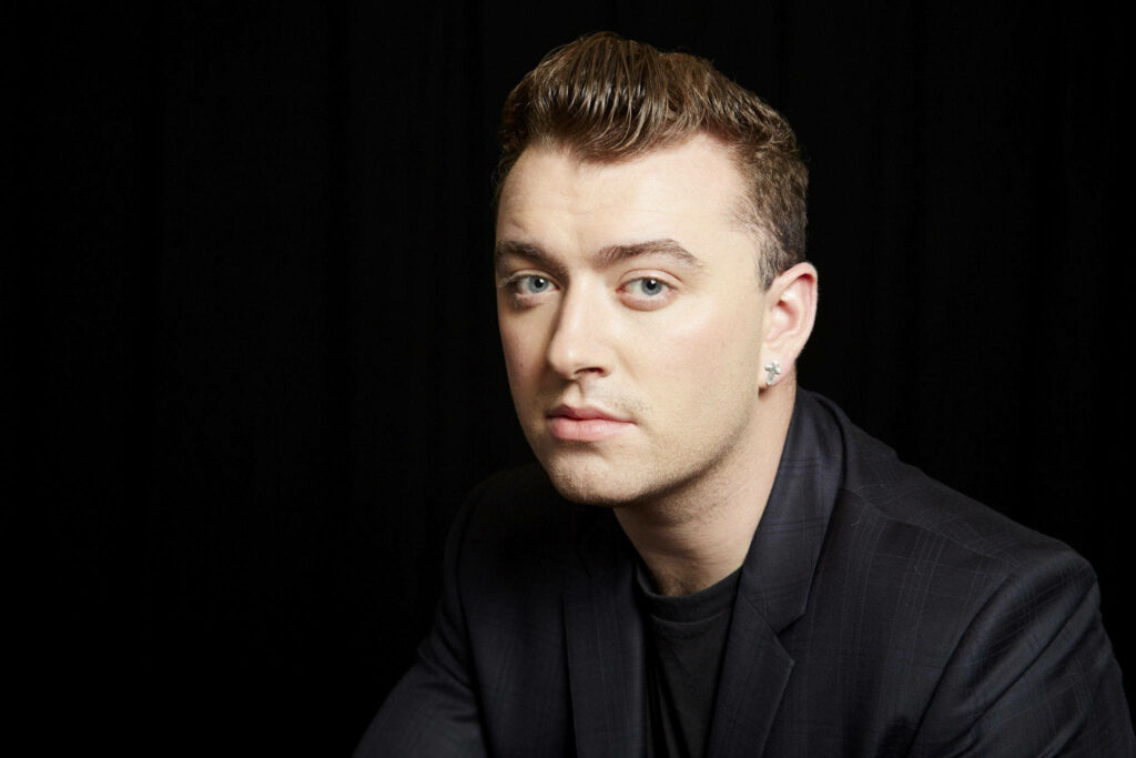 Stylish Sam Smith Portrait on Dark Wallpaper Background