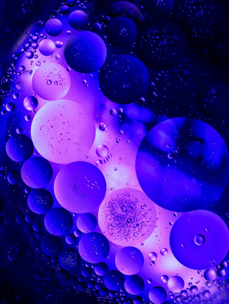 Macro Purple Bubbles Wallpaper: Intricate Patterns on Dark Background
