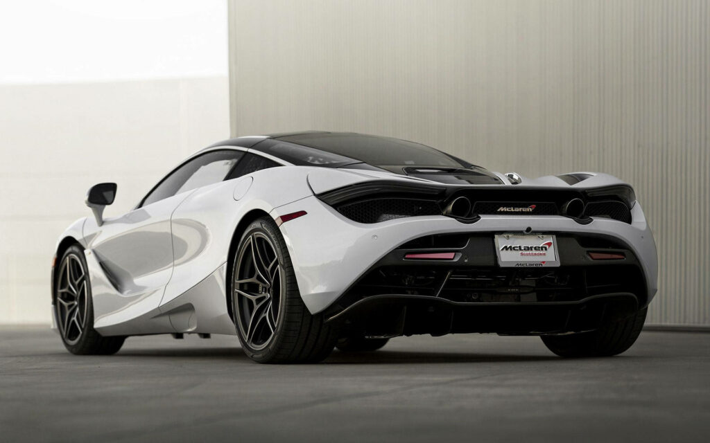 Pearl White Perfection: Behold the Mesmerizing Rear View of the McLaren 720s Spider Wallpaper