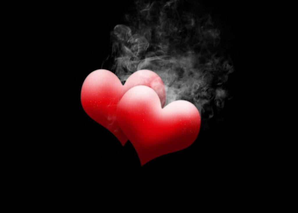 Romantic Red Hearts Wallpaper: Smoky Dark Background Design