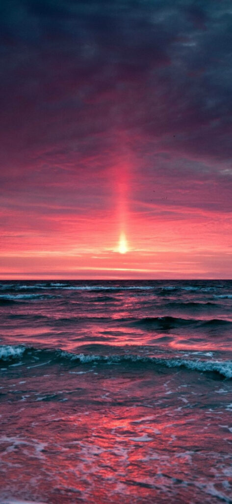 Captivating Red Sunset Reflects on Iphone 11 Pro: A Breathtaking Wallpaper Shot