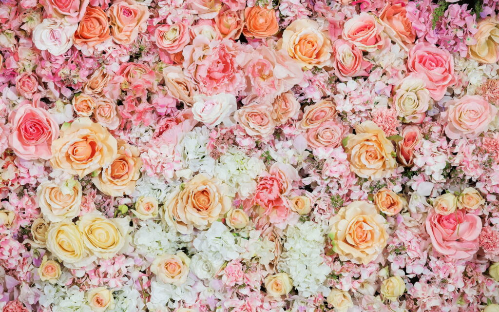 Blooming Beauties: A Mesmerizing Floral Tapestry with Pink Roses Wallpaper