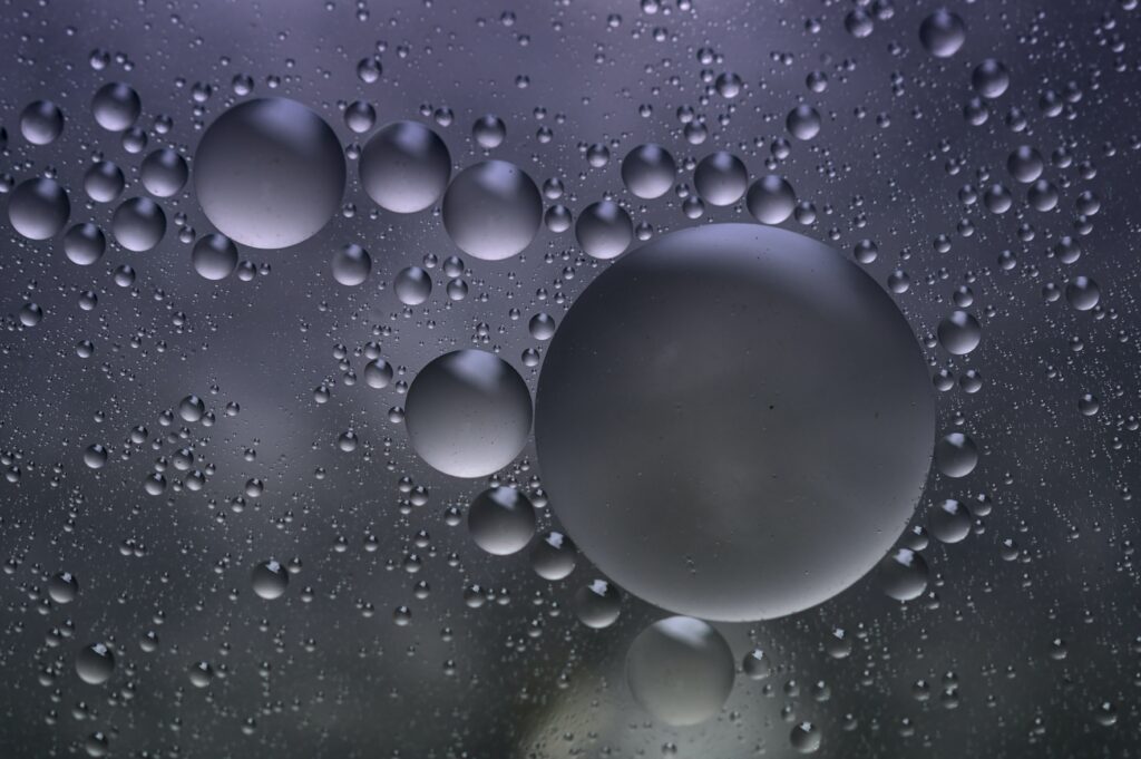 Elegant Gray Background with Round Bubbles in Water Wallpaper