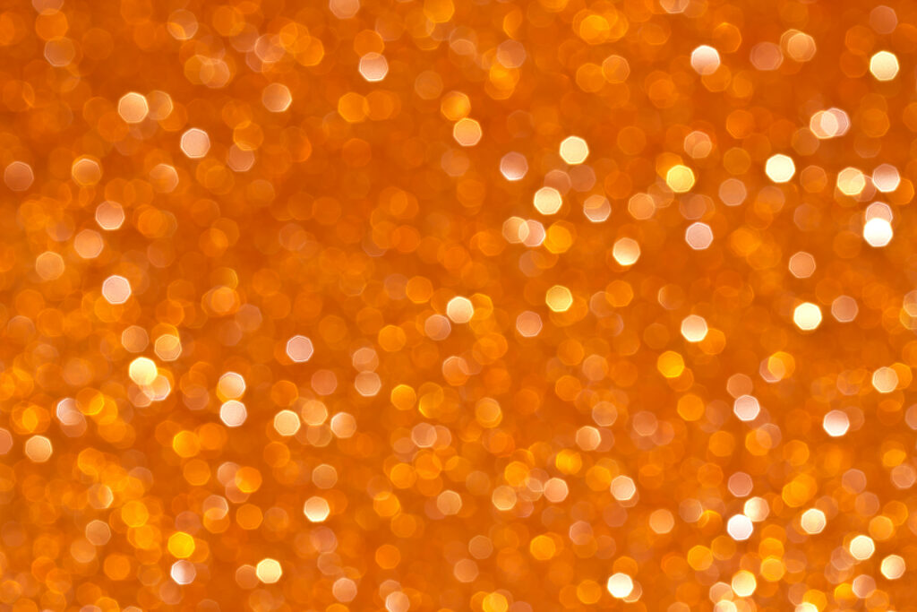 Bursting Sunshine: Shiny Orange Bokeh Wallpaper for Gorgeous Background