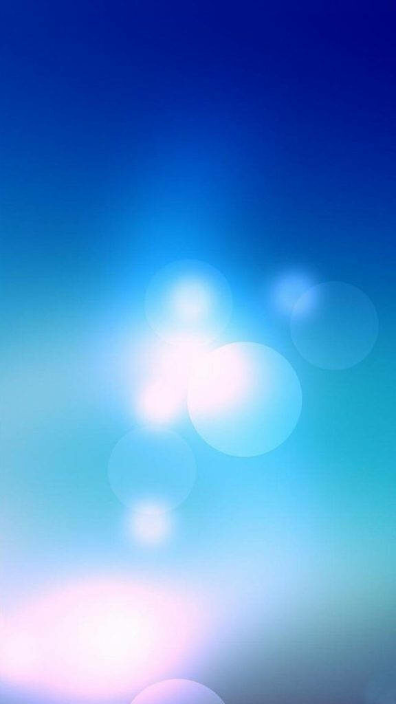Vibrant Bokeh Lighting against a Serene Blue Sky - Samsung Galaxy Note 5 Background Wallpaper