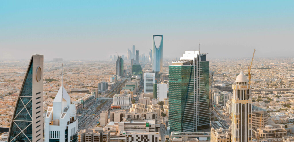 Captivating Bird's Eye View: Majestic Skyscrapers Grace the Luxurious Riyadh Cityscape Wallpaper
