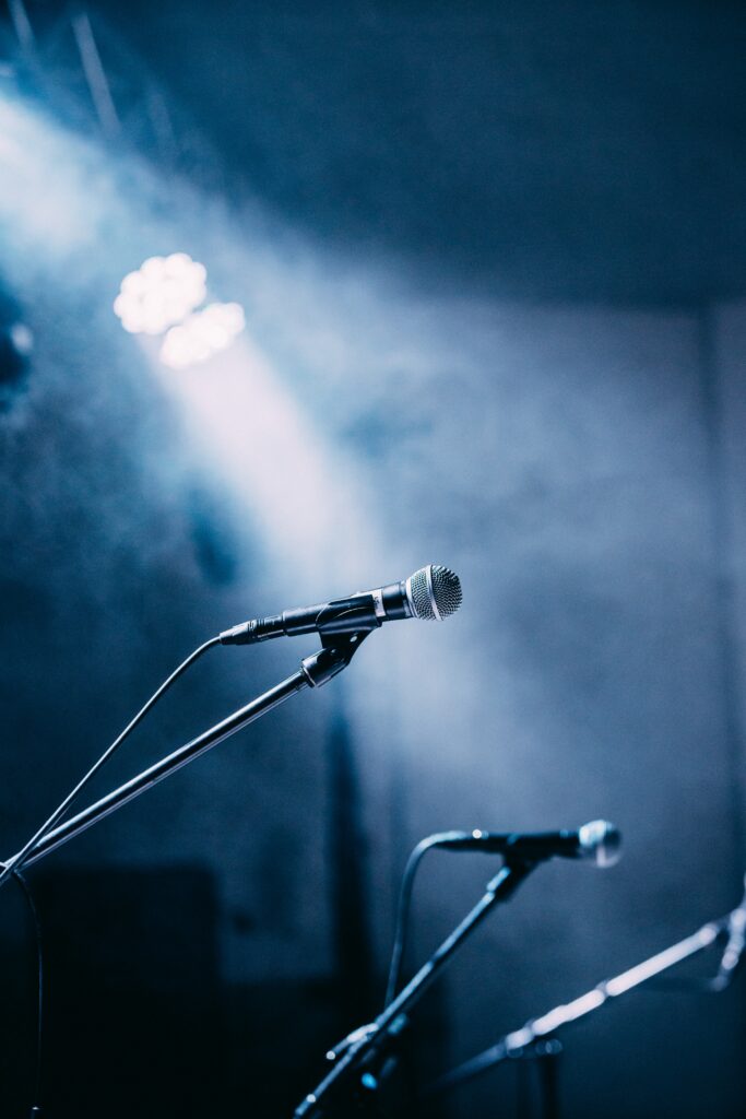Stunning Stage Microphone Wallpaper: Illuminated & Misty Ambiance