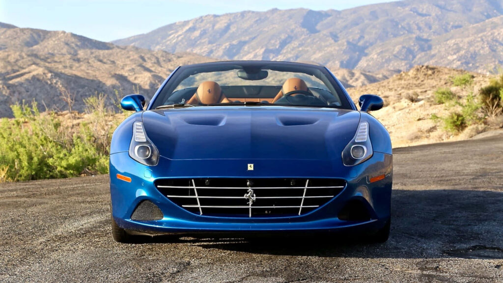 Sunset Serenade: The Enchanting Beauty of the Ferrari California T - A Captivating Blend of Style, Speed, and Splendor Wallpaper