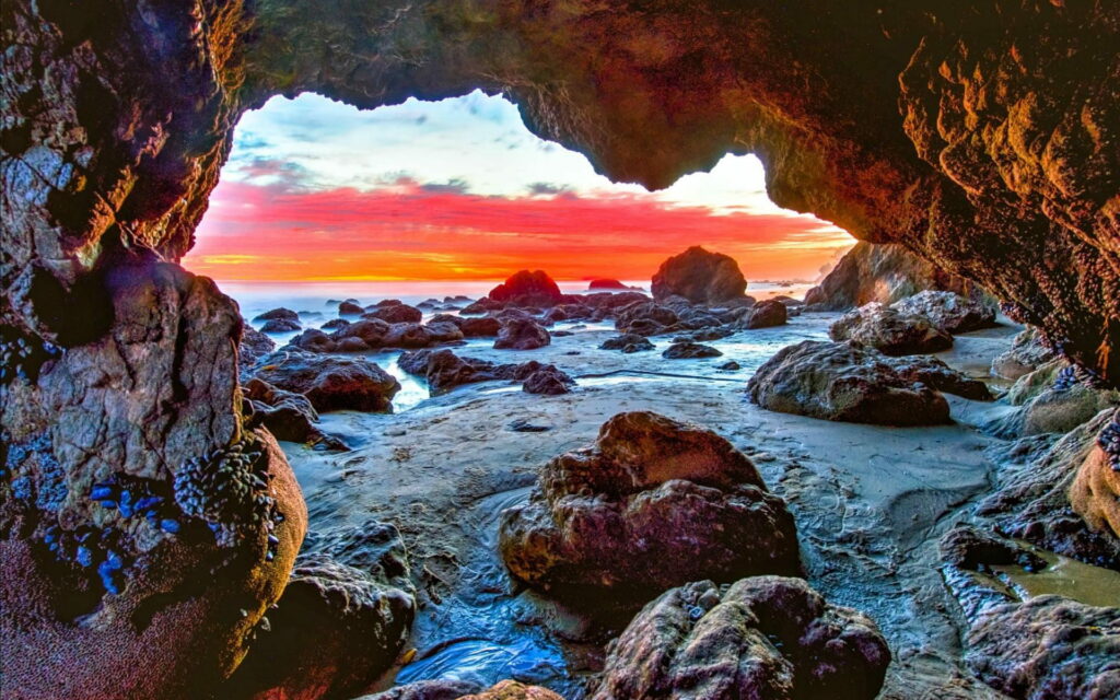 Serenity Found: Captivating California Sunset at Malibu's Enchanting Sea Cave Beach Wallpaper
