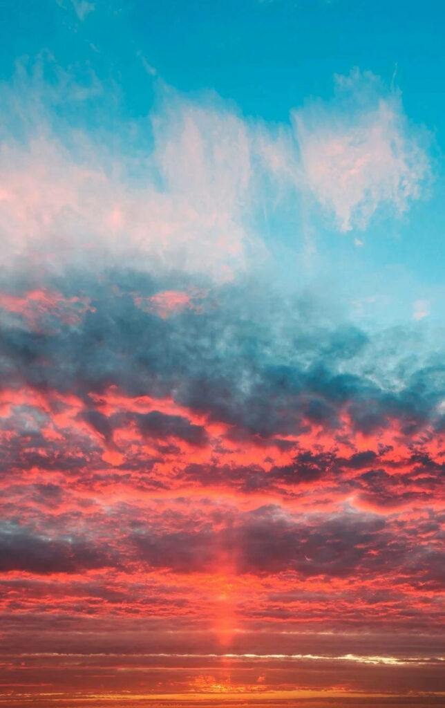 Vibrant Horizons: Capturing the Serenity of Teal and Orange Sunset Sky Wallpaper