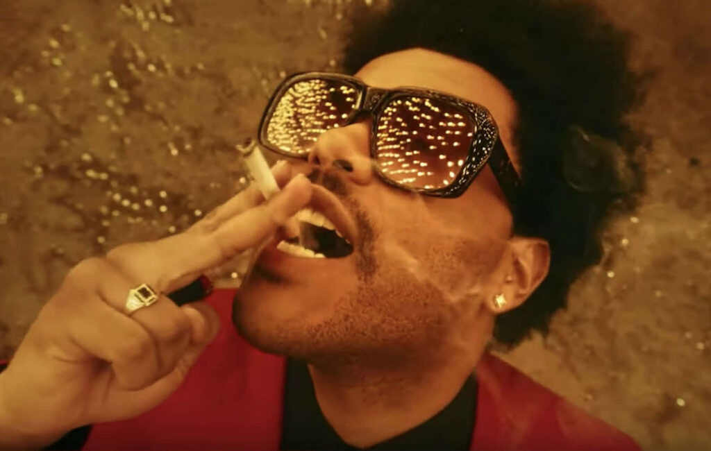 Stunning The Weeknd After Hours Wallpaper: Iconic Red Suit & Glow