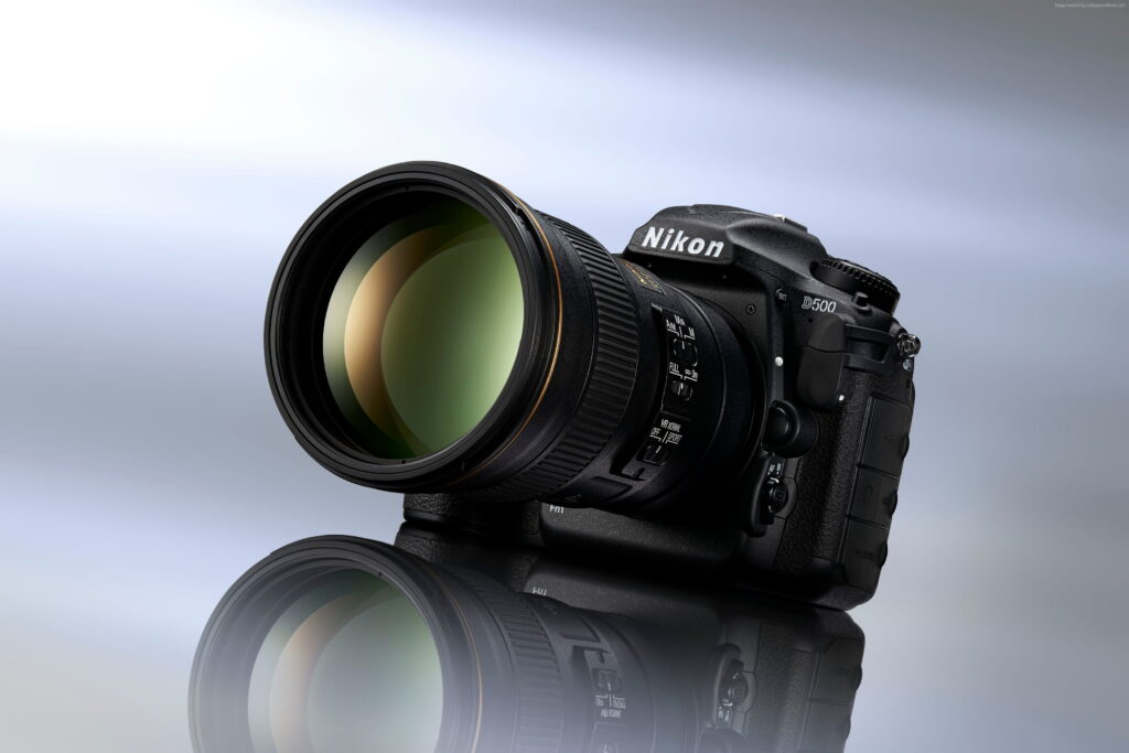 Captivating DSLR Shot: Nikon D500 Showcasing Stunning Body in QHD Wallpaper