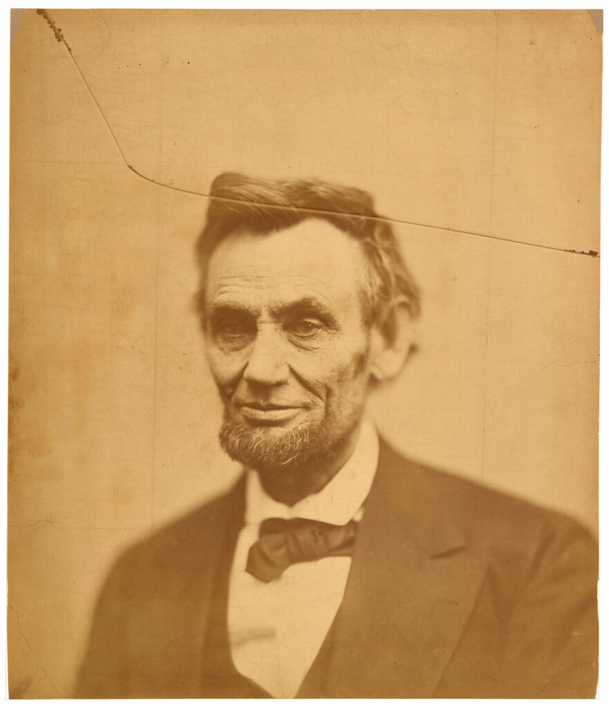Capturing Abraham Lincoln's Final Smiling Glimpse Wallpaper in QHD 2K 2500x2905 Resolution