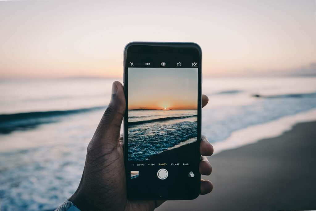 Capturing the Majestic Sunrise/Sunset Horizon with an iPhone: A Photographer's Delight Wallpaper