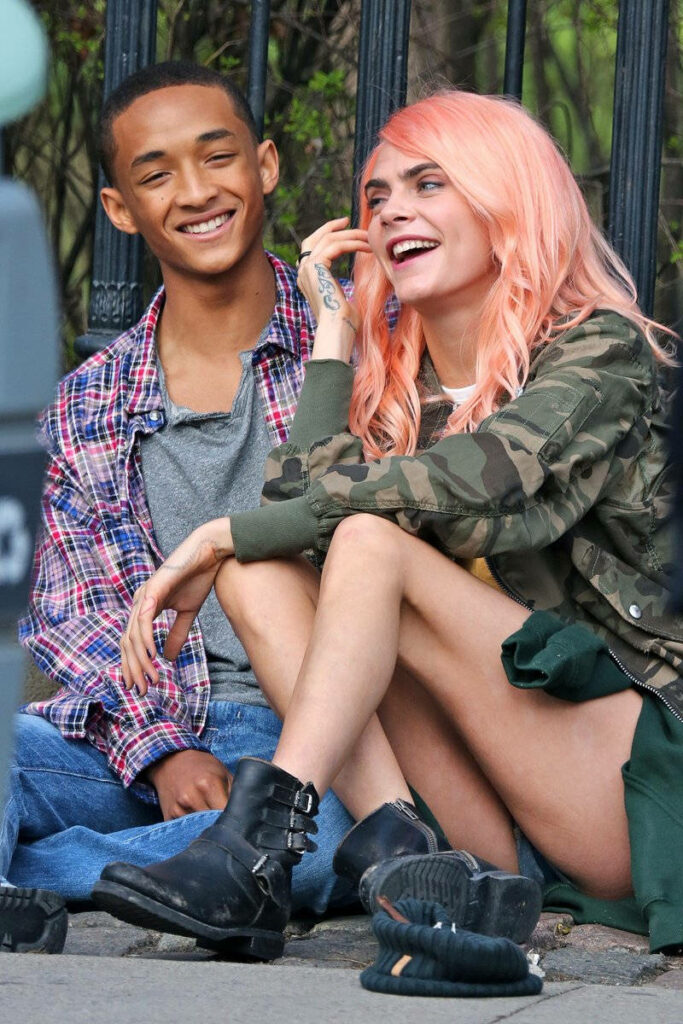 Cheerful Outdoor Wallpaper: Cara Delevingne & Jaden Smith's Stylish Vibe