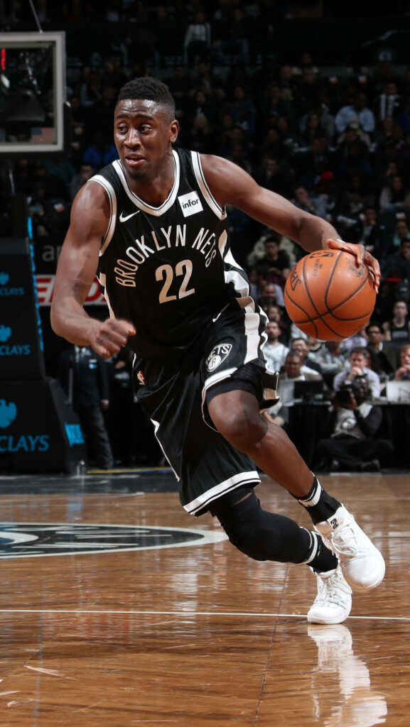 Caris LeVert Brooklyn Nets dribbling basketball intense focus Barclays Center action shot Wallpaper