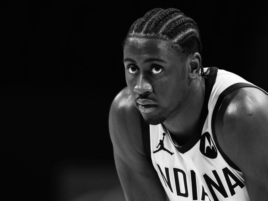 Caris LeVert Indiana Pacers grayscale wallpaper intense focus braided hair sports portrait