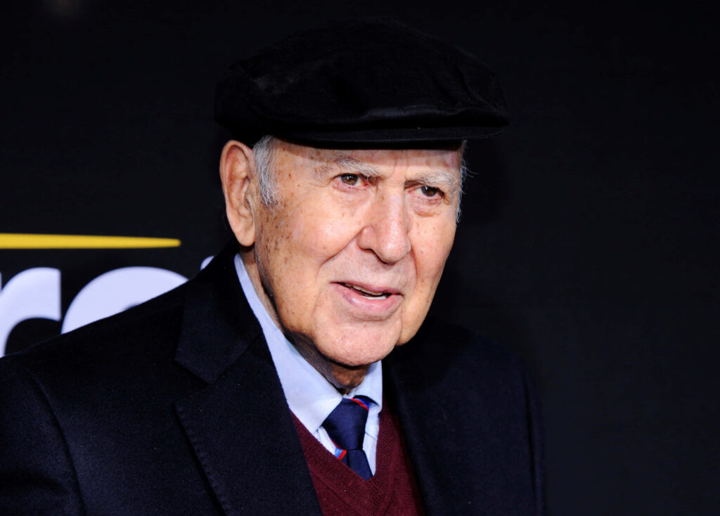 Carl Reiner portrait wallpaper classic black suit cap warm natural tones entertainment legacy