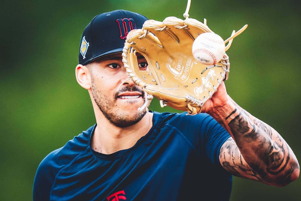 Carlos Correa Minnesota Twins making a precise catch with Rawlings glove baseball wallpaper