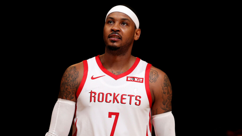 Carmelo Anthony in Houston Rockets number 7 jersey focused pose vibrant red white black background wallpaper