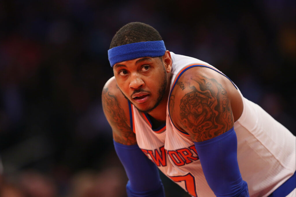 Carmelo Anthony intense NBA 2015 photoshoot New York Knicks uniform tattoos athletic build Wallpaper