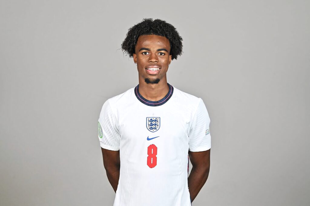 Carney Chukwuemeka in England football kit number 8 standing confidently on gray background Wallpaper