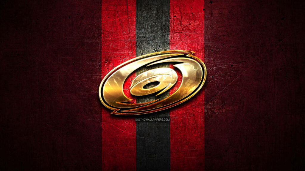 Carolina Hurricanes wallpaper with bold gold logo on textured red and black striped background