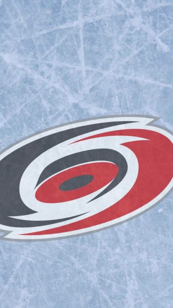 Carolina Hurricanes logo on textured pastel blue ice rink background sports wallpaper