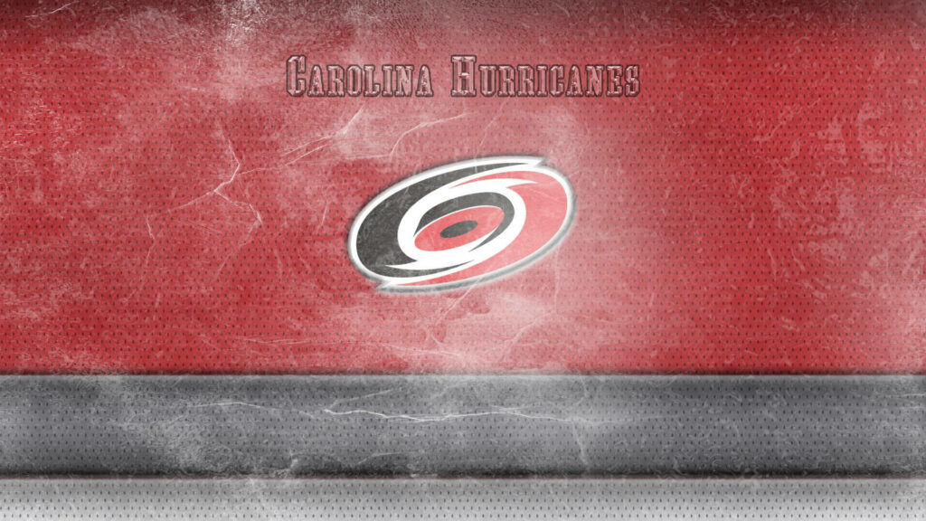 Carolina Hurricanes logo centered on red smoky textured background NHL hockey team wallpaper