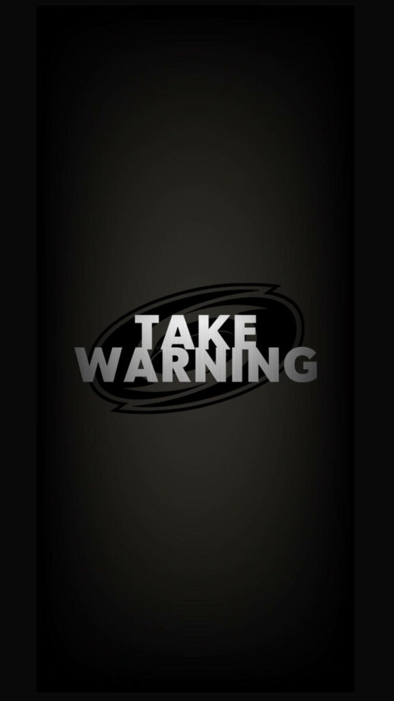 Carolina Hurricanes Take Warning wallpaper with bold metallic text on dark gradient background