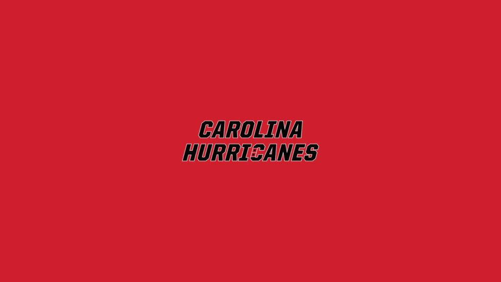 Carolina Hurricanes wallpaper bold red background black and white text NHL team spirit design