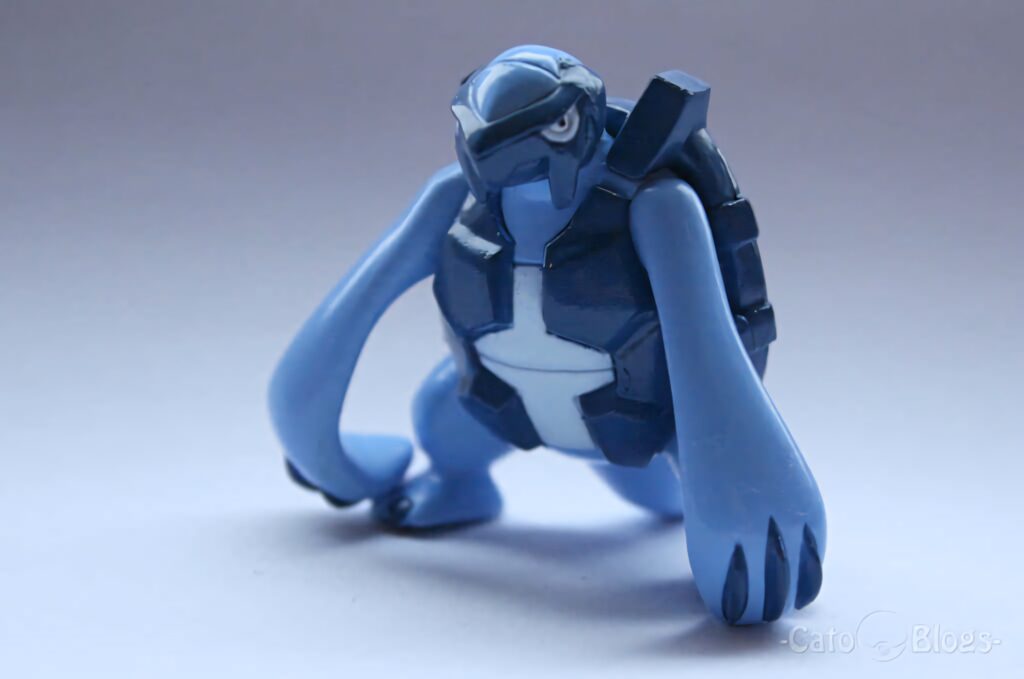 Detailed Carracosta Pokémon figurine with rugged blue shell and realistic textures on gradient background Wallpaper