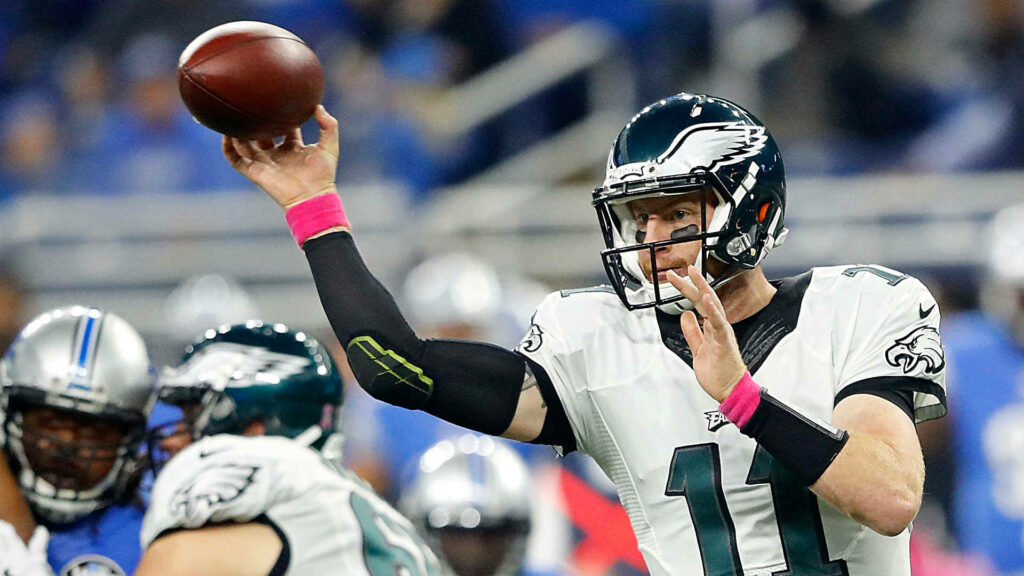 Carson Wentz Philadelphia Eagles quarterback throwing football intense game action wallpaper