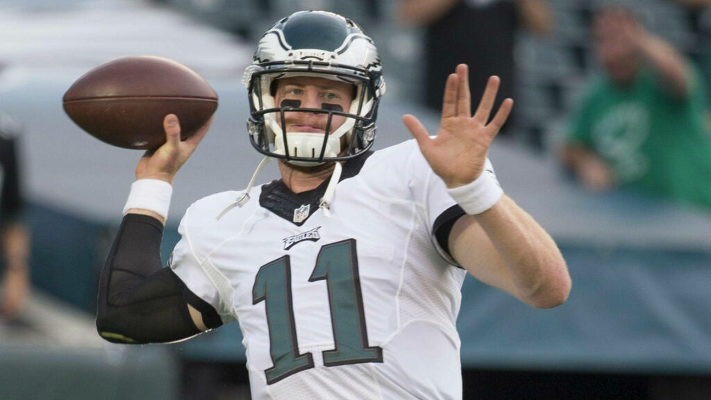Carson Wentz NFL action wallpaper Philadelphia Eagles quarterback throwing football in stadium