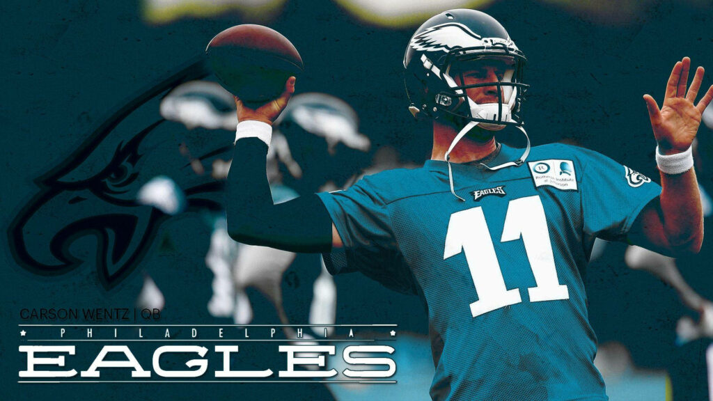 Carson Wentz Philadelphia Eagles quarterback in green jersey number 11 with Eagles logo background Wallpaper