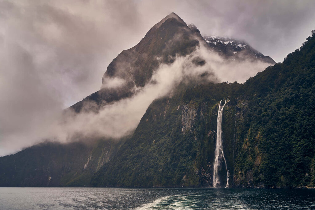 Cascading Waterfall Wallpaper: Serene Milford Sound Background