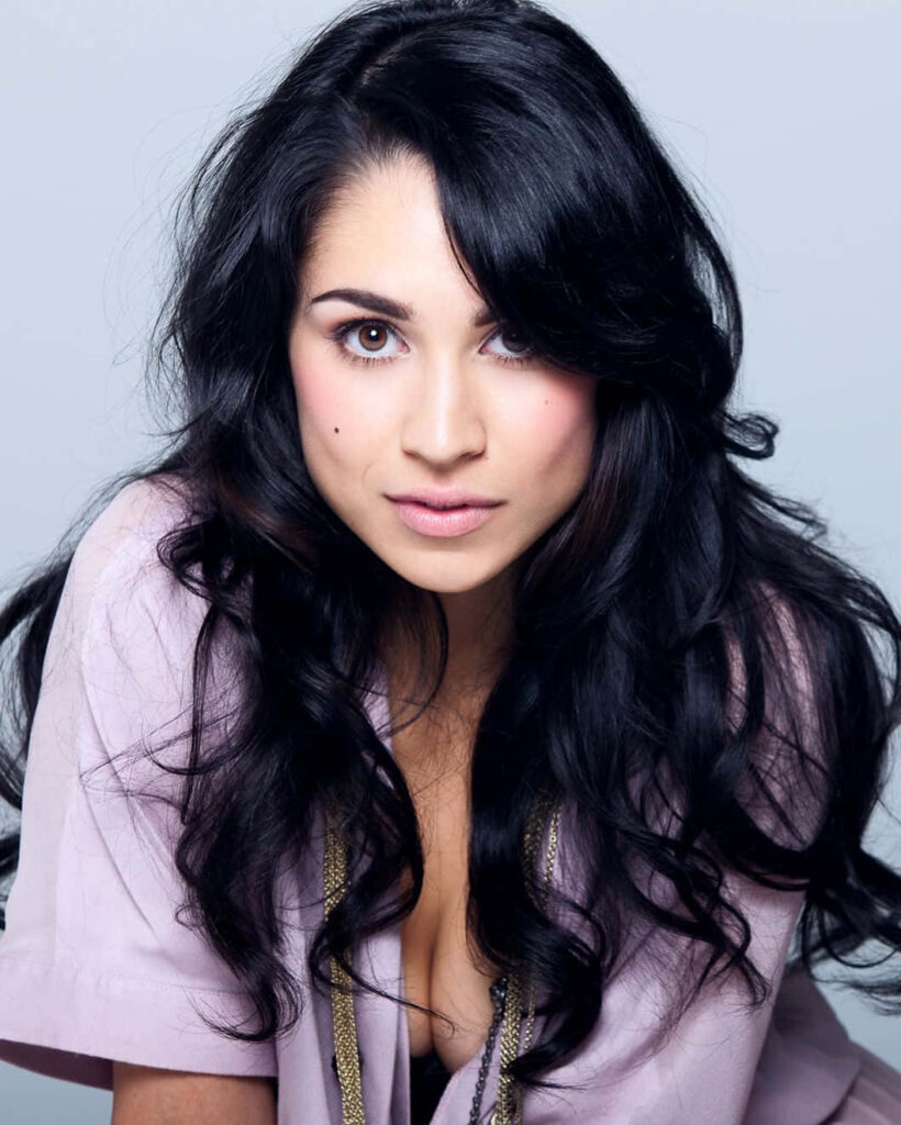 Cassie Steele portrait wallpaper with flowing dark hair soft natural look elegant modern style