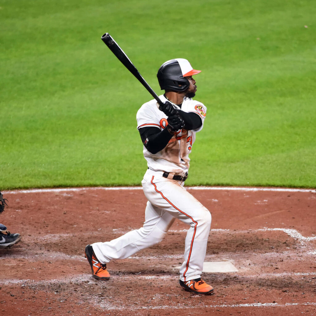 Cedric Mullins Orioles batter at plate dynamic action vivid green grass high definition MLB wallpaper