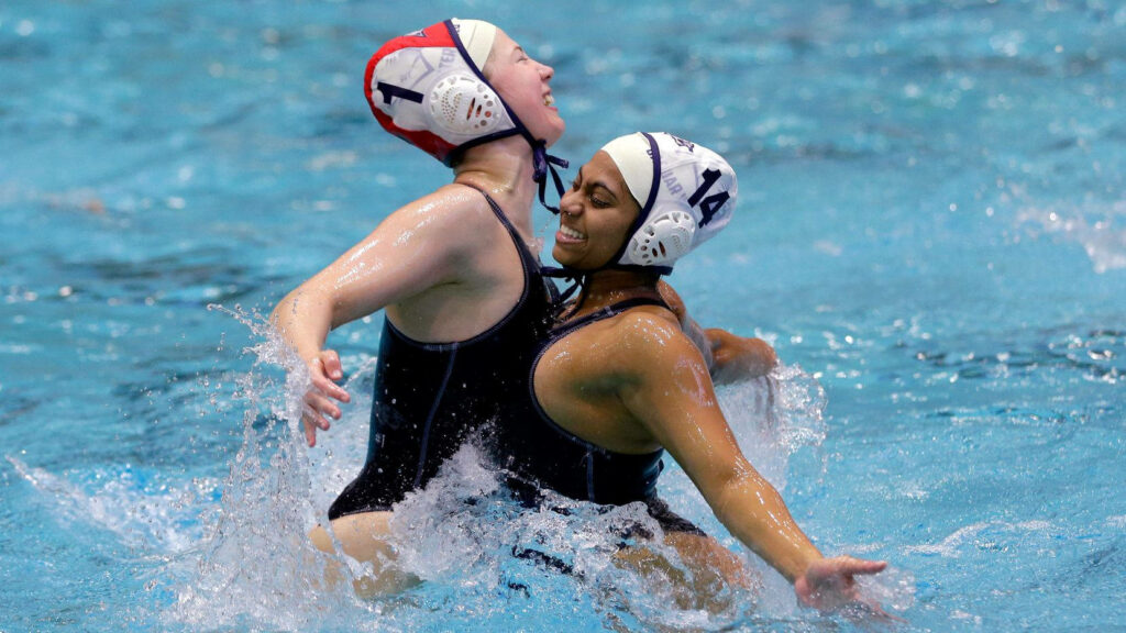 Celebrating Female Water Polo Athletes: Energetic Wallpaper Background