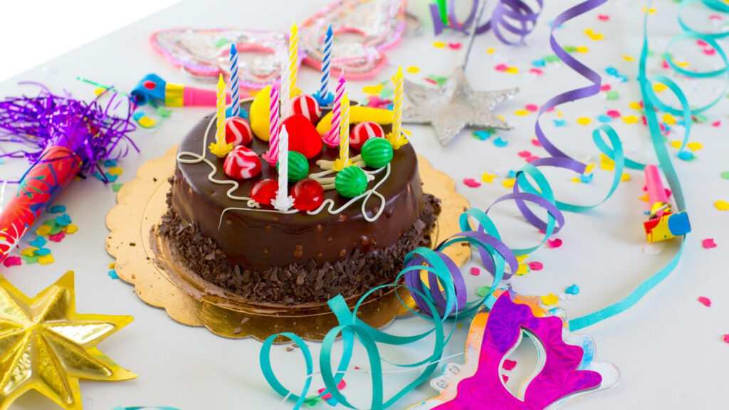 Celebration Galore: Vibrant Candyland Cake Stealing the Spotlight - Festive Birthday Cake Background Wallpaper