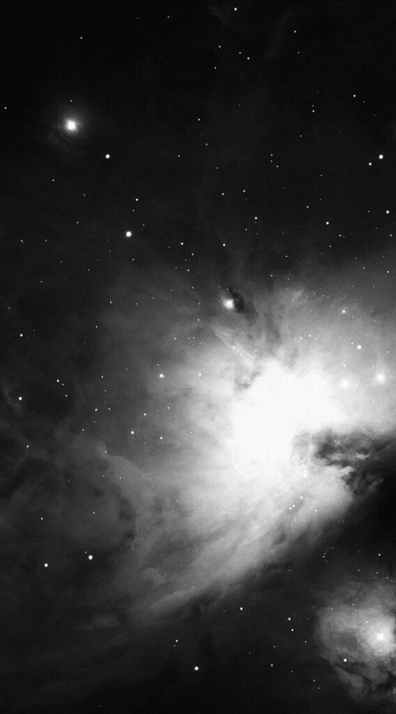 Stunning black space wallpaper with glowing stars and cosmic clouds, capturing the universe's beauty.