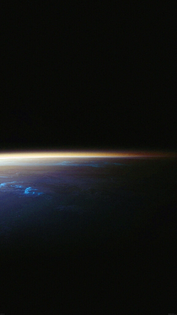 Stunning Cosmic Glow: Striking Android Wallpaper Showcasing Earth's Enchanting Outer Space