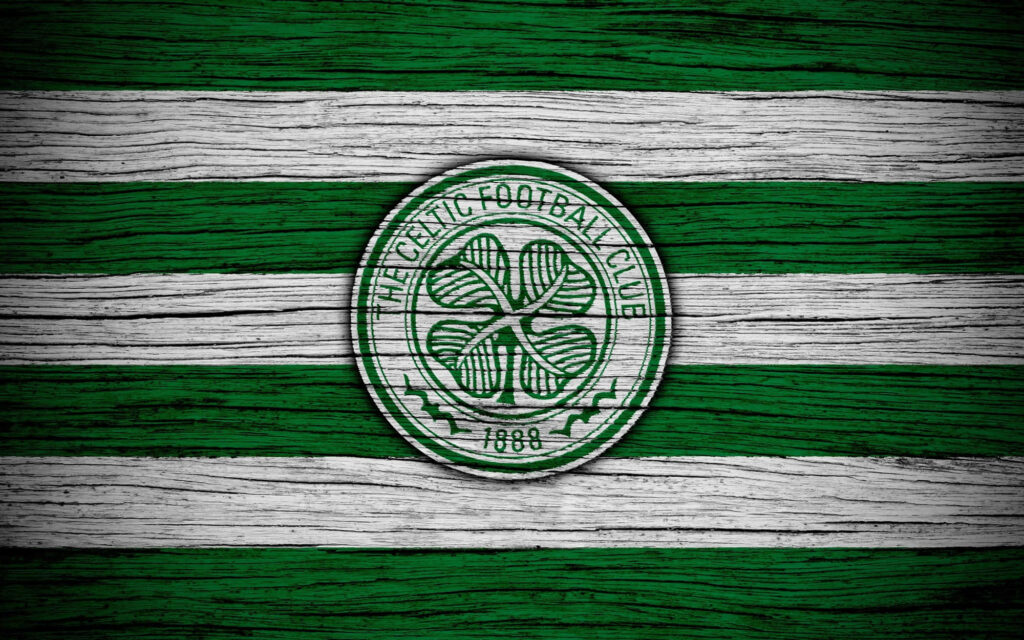 Celtic FC crest on rustic wooden background with green and white hoops vintage wallpaper