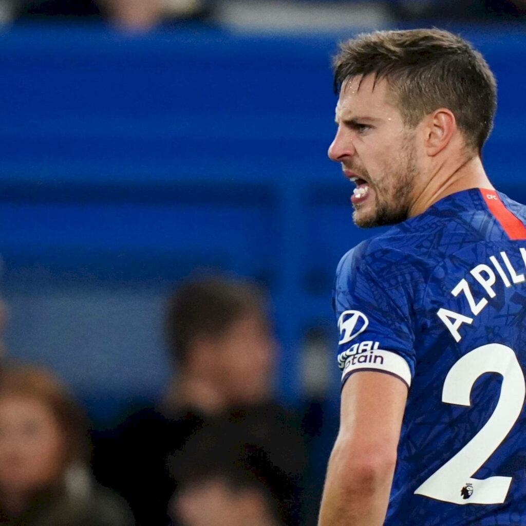 César Azpilicueta Chelsea kit intense action football pitch bold blue dynamic sports wallpaper
