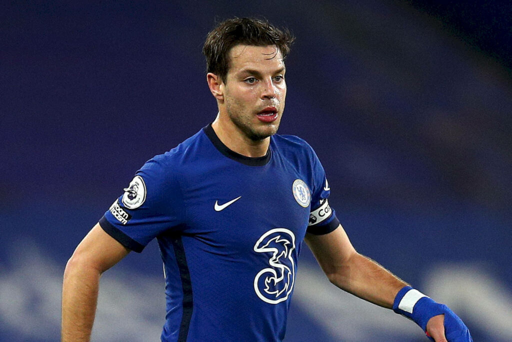 César Azpilicueta in Chelsea FC blue kit showing focus and motion during football match Wallpaper
