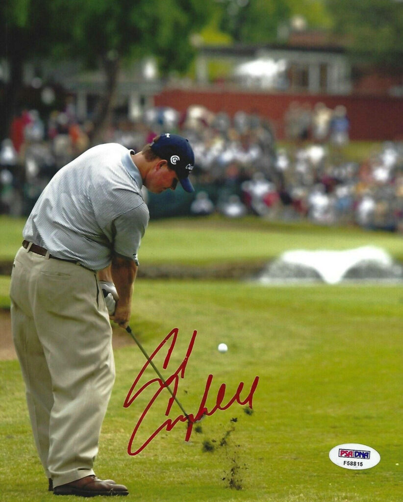 Chad Campbell mid golf swing on green course with crowd and autograph sports wallpaper