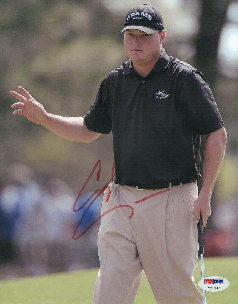 Professional golfer Chad Campbell mid-gesture on green with autograph in natural sports wallpaper