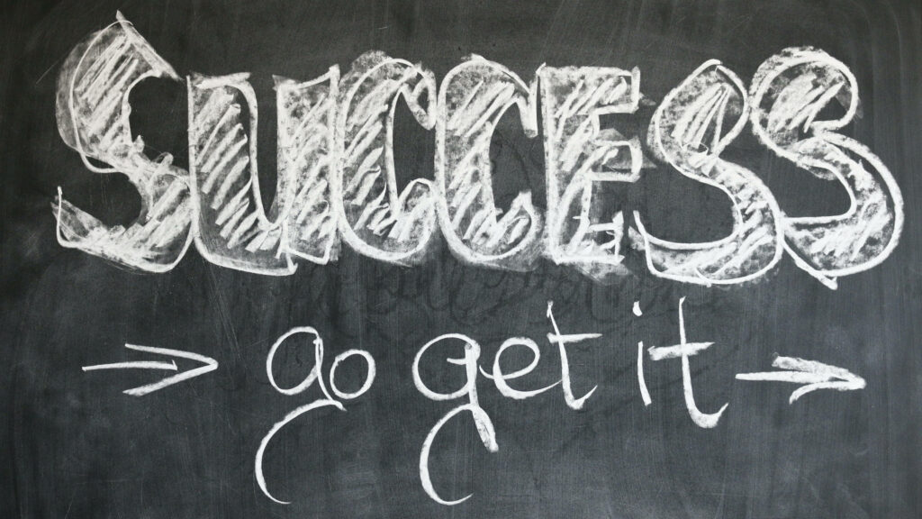 Achieving Greatness: Empowering Success and Motivation on a Chalkboard Canvas - Inspiring 4K Ultra HD Background Wallpaper