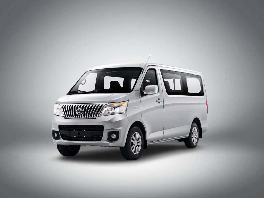 Changan silver van in studio with modern grille spacious design on gray gradient background wallpaper