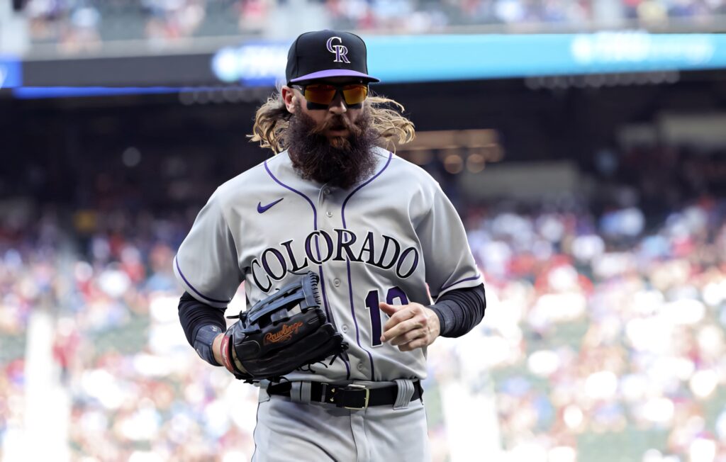 Charlie Blackmon Colorado Rockies running on field gray uniform flowing hair and beard vibrant colors Wallpaper